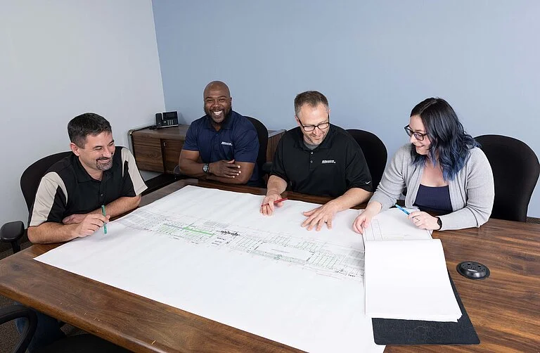Millennium Control Systems employees at work in the Beachwood, Ohio facility